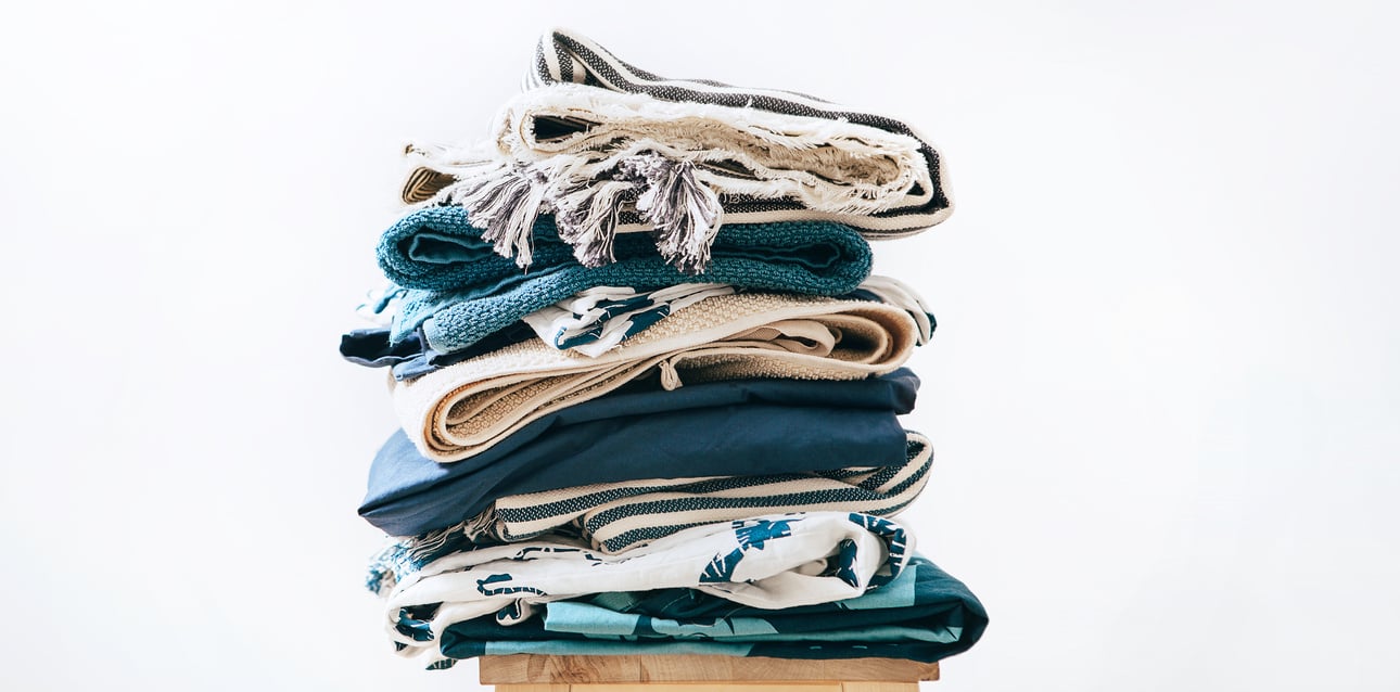 pile of blue and beige laundry 2